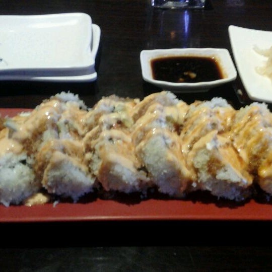 Photo taken at Sushi Delight by Ally L. on 3/3/2012