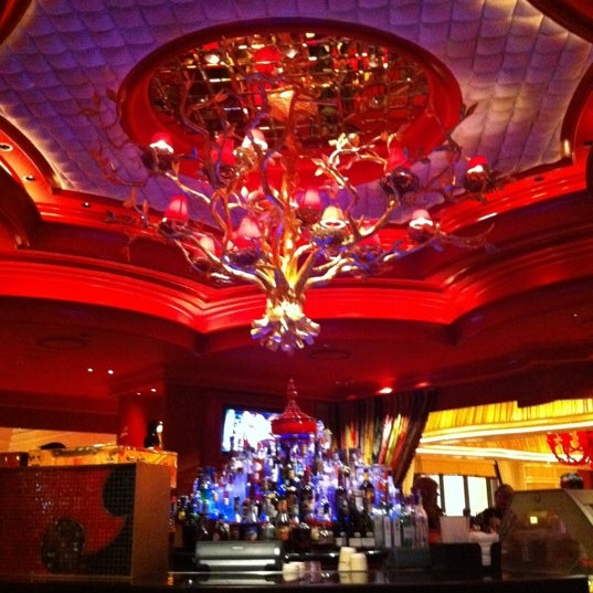 Photo taken at Encore Lobby Bar &amp; Cafe by Tedi J. on 12/13/2011