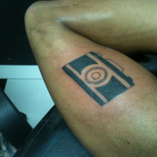 Photo taken at House of Pain RJ - Tattoo &amp; Piercing Center by Melissa D. on 5/12/2012