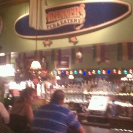 Photo taken at Rumrunners Pub &amp; Eatery by Howie B. on 9/8/2012