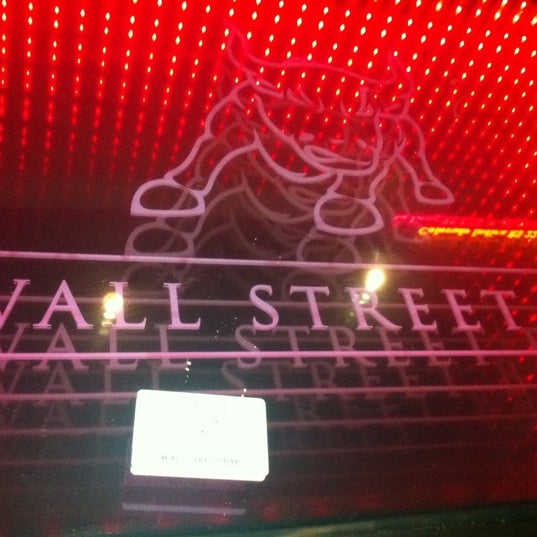 Photo taken at Wall Street Bar by Thabata d. on 2/17/2012