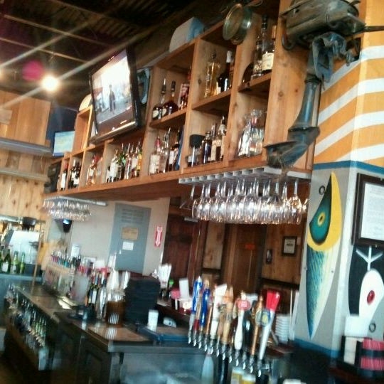 Photo taken at Atlas Oyster House by Sarah W. on 12/27/2011