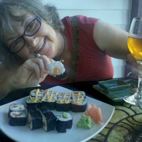 Photo taken at Teak Thai Cuisine &amp; Sushi Bar by Scott L. on 7/15/2011