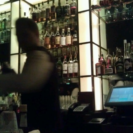 Photo taken at The Bar at The Peninsula by Steve H. on 6/24/2012