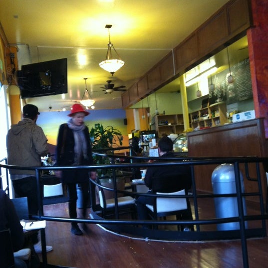 Photo taken at Oasis Cafe by Rosemarie M. on 3/27/2012