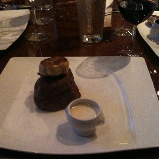 Photo taken at Prime 1000 | Steak &amp; Cocktail House by Alicia T. on 5/15/2011