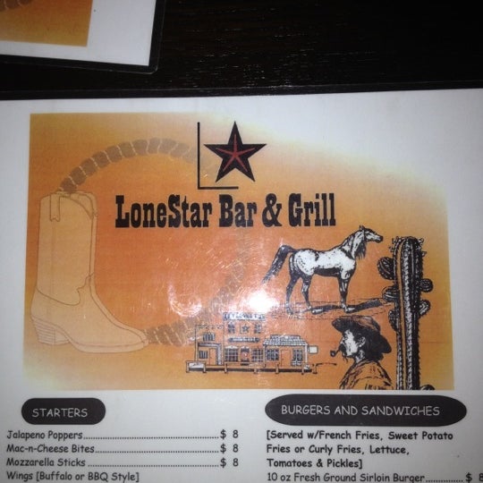 Photo taken at LoneStar Bar &amp; Grill by Crystal B. on 3/24/2012