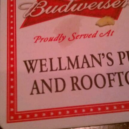 Photo taken at Wellman&#39;s Pub &amp; Rooftop by Aliou K. on 1/6/2012