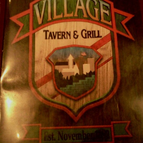 Photo taken at Village Tavern &amp; Grill by Lexi W. on 10/20/2011
