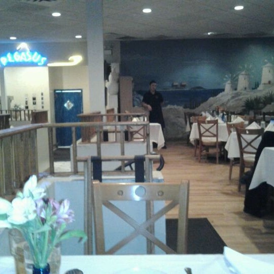 Photo taken at Pegasus Restaurant and Taverna by Garry L. on 1/16/2012