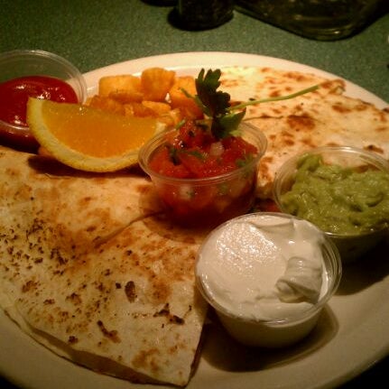 Photo taken at The Mossfire Grill by Tiffany D. on 2/12/2012
