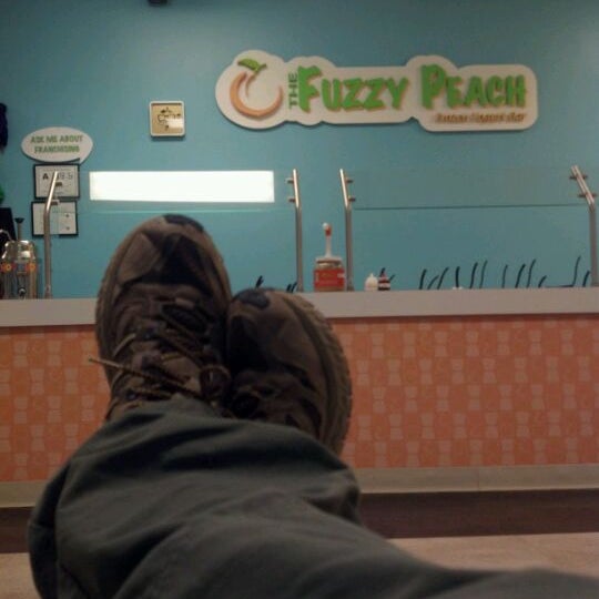 Photo taken at The Fuzzy Peach Racine by Matthew A. on 1/12/2012