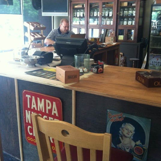 Photo taken at Tobacco Road Coffee &amp; Smoke Shop by Nathan M. on 6/21/2012