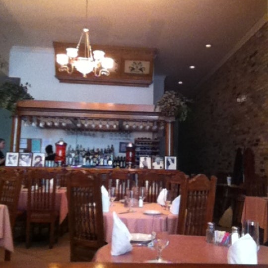 Photo taken at Olivier&#39;s Creole Restaurant in the French Quarter by Joni J. on 6/9/2012