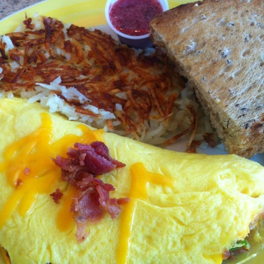 Photo taken at The Omelette Shoppe by Nick D. on 3/11/2012