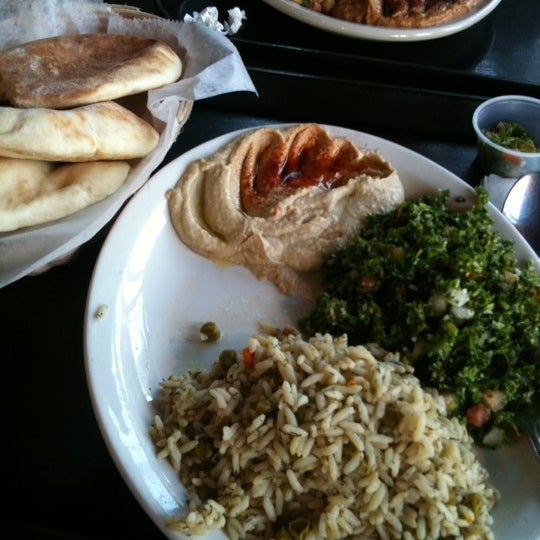 Photo taken at Aladdin Mediterranean Cuisine by Nicki S. on 4/8/2012