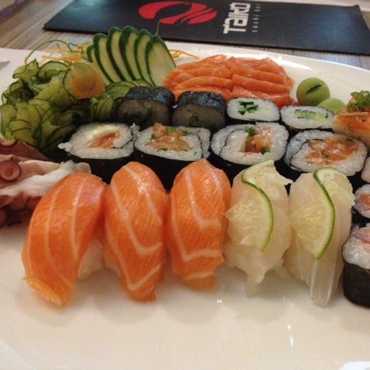 Photo taken at Taiko Sushi Bar by Adriane A. on 3/23/2012