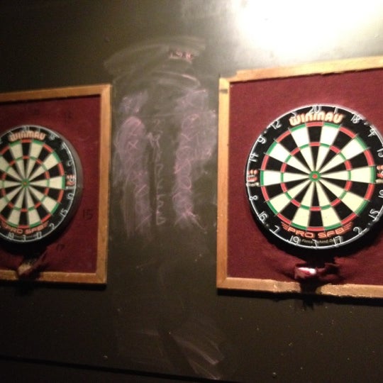 Play darts — it's to the left of the bar