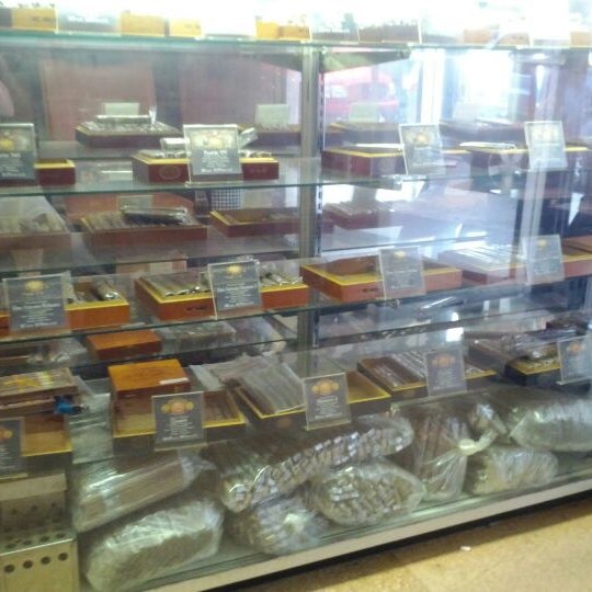 Photo taken at Martinez Handmade Cigars by DanLikes on 6/2/2012