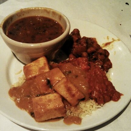 Photo taken at Monsoon Fine Cuisine of India by Julie D. on 6/1/2012