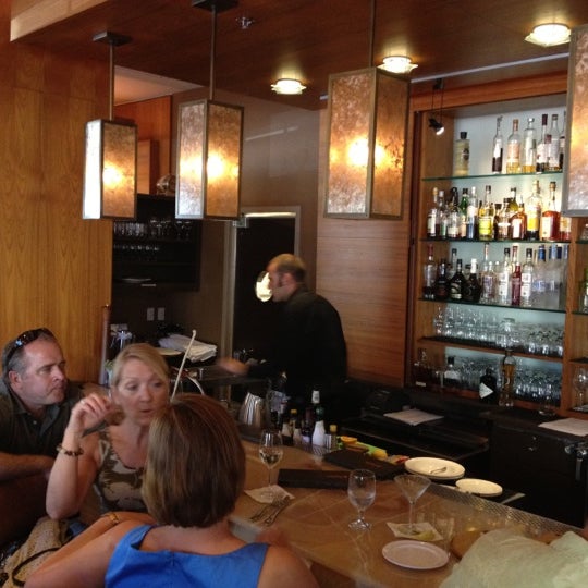 Photo taken at Trellis Restaurant by John M. on 8/5/2012