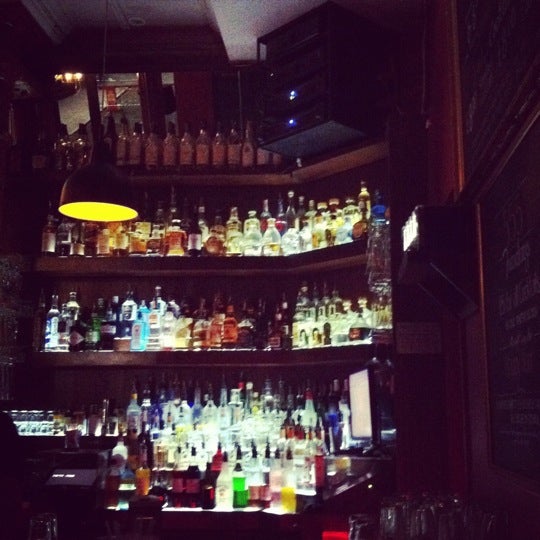 Photo taken at Fifty Five Bar by Adeline T. on 6/13/2012