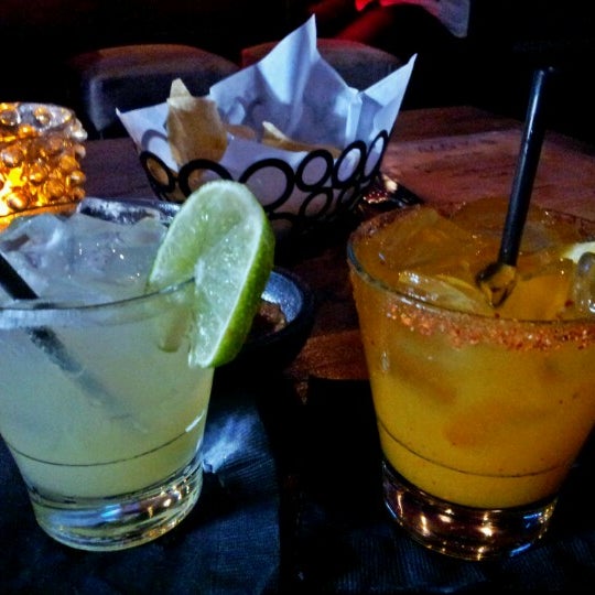Photo taken at Agaves Kitchen/ Tequila by Angel G. on 9/8/2012