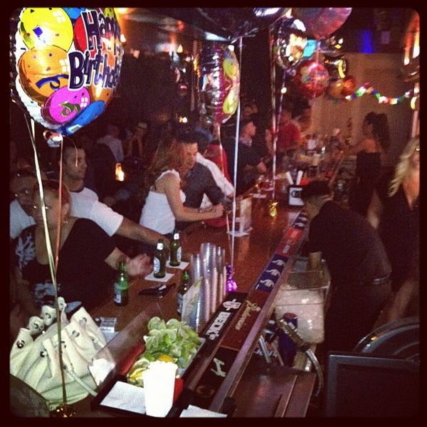 Photo taken at Tropix Bar &amp; Lounge by Alexander F. on 7/4/2012