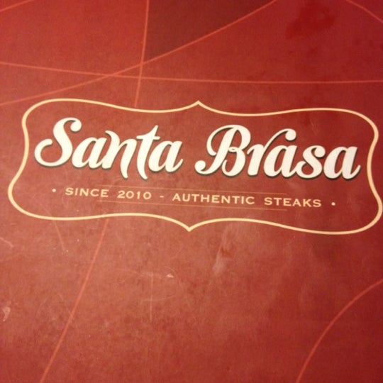 Photo taken at Santa Brasa Authentic Steaks by Leonardo A. on 5/12/2012