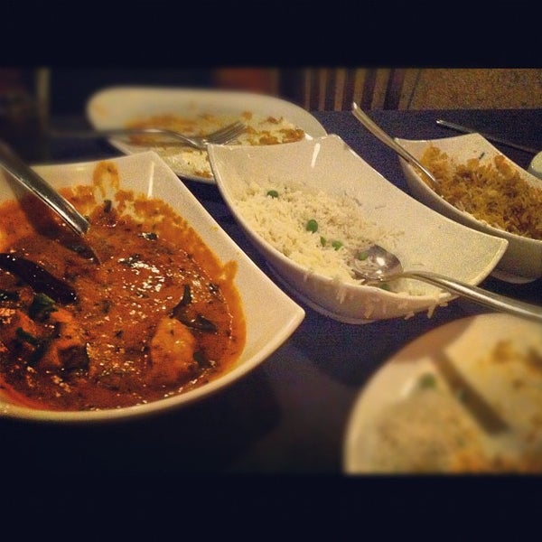 Photo taken at Bollywood Bistro by Chanda H. on 6/28/2012