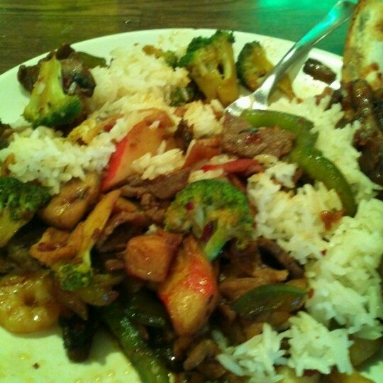 Photo taken at Empire Fire Mongolian Grill by George J. on 9/8/2012