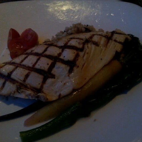 Photo taken at Ponti Seafood Grill by Julia W. on 3/2/2012