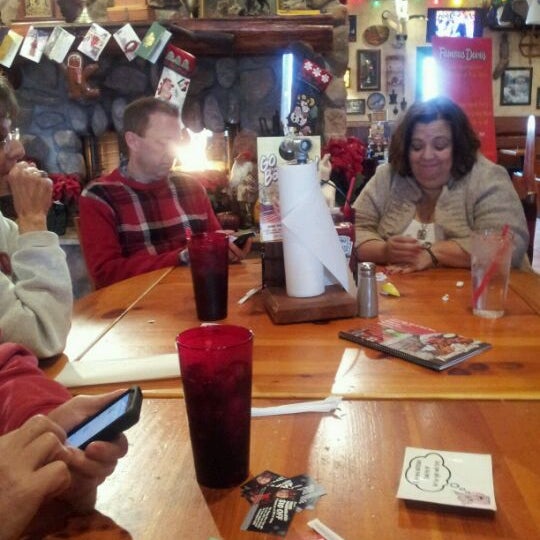 Photo taken at Famous Dave&#39;s by David B. on 12/26/2011