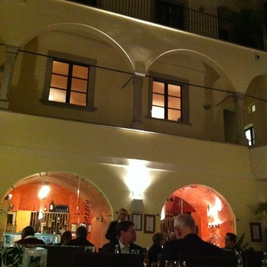 Photo taken at Flowers restaurant &amp; wine bar by Oleg B. on 11/21/2011