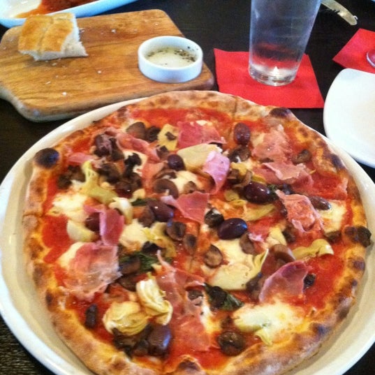 Photo taken at Pizzeria Mimosa by Alexandra on 7/1/2012