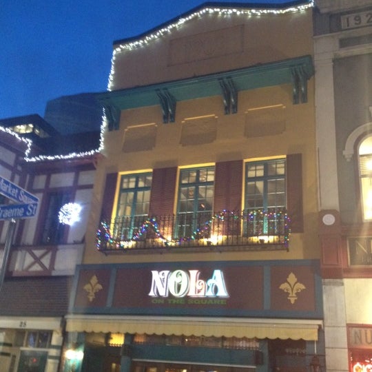 Photo taken at NOLA on the Square by shaun q. on 12/14/2011
