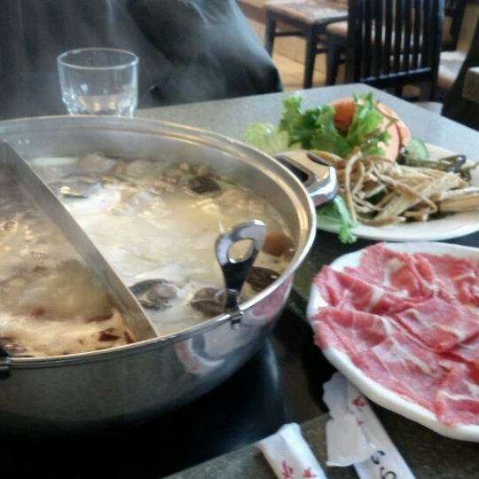Photo taken at Happy Lamb Hot Pot by Si L. on 12/9/2011