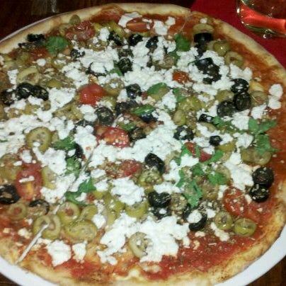 The olive pizza has lots of flavors going on - it's certainly very tasty!
