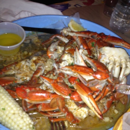 Photo taken at Bum Rogers Crab House &amp; Tavern by Barry on 7/24/2012