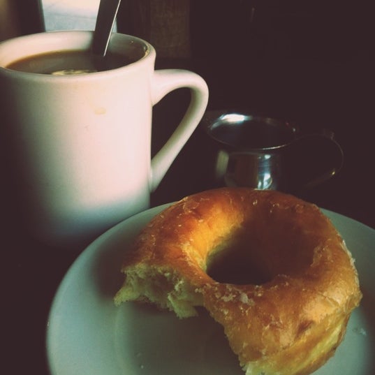 Photo taken at Sunset Park Diner &amp; Donuts by Nate S. on 5/12/2012