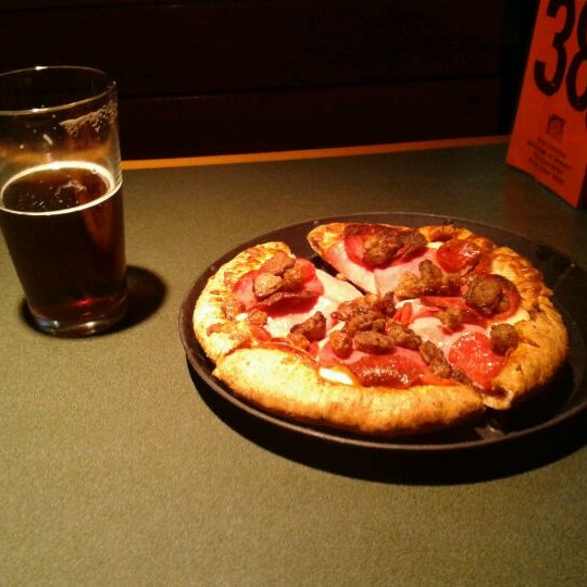 Photo taken at Woodstock&#39;s Pizza by Sean P. on 2/2/2012