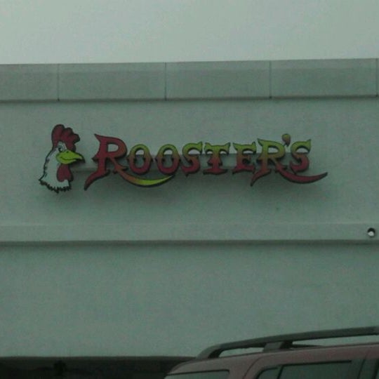 Foto tomada en Rooster&#39;s Restaurant  por Adam G. el 8/20/2011