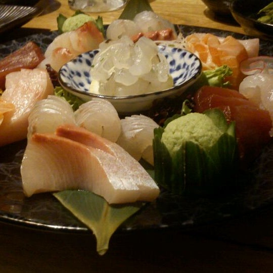 Photo taken at Kumo Izakaya &amp; Sake Bar by Lou P. on 9/20/2011