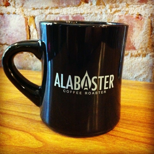 Photo taken at Alabaster Coffee Roaster &amp; Tea Co. by Karl F. on 12/24/2011