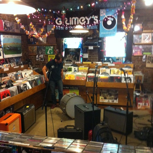 Photo taken at Grimey&#39;s New &amp; Preloved Music by Justin W. on 6/29/2012