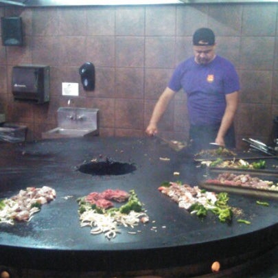 Photo taken at bd&#39;s Mongolian Grill by Shelli D. on 9/1/2012