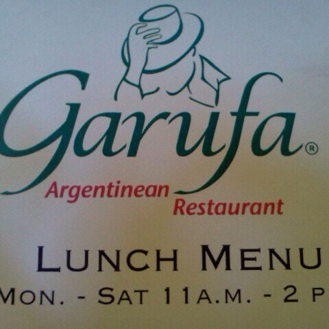 Photo taken at Garufa Argentinean Restaurant by Erika R. on 11/2/2011