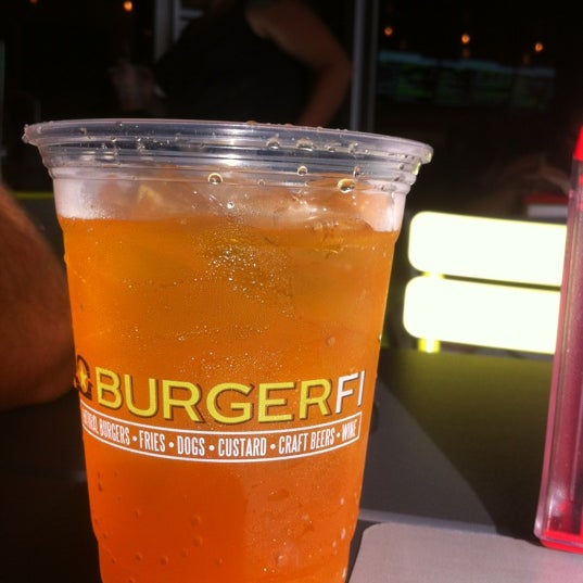 Photo taken at BurgerFi by Alison Z. on 8/5/2012