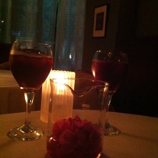 Photo taken at Tagine Beverly Hills by Claudia C. on 4/6/2012