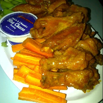 Photo taken at Atomic Wings by Amnah A. on 6/23/2012